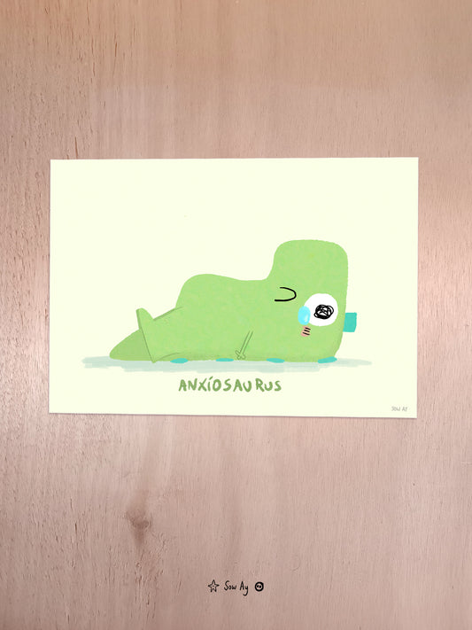 un petit dinosaure, allongé sur le dos, que l'on voit de profil. Il pleure et en bas il est écrit ANXIOSAURUS.