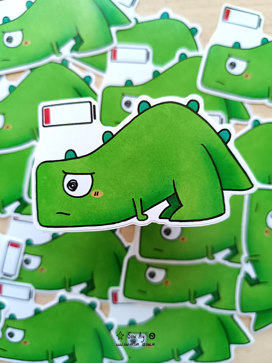 petit dinosaure vert, à l'air soucieux et fatigué, penché en avant avec au dessus de lui une batterie similaire aux batteries de téléphone et il ne reste qu'une barre rouge